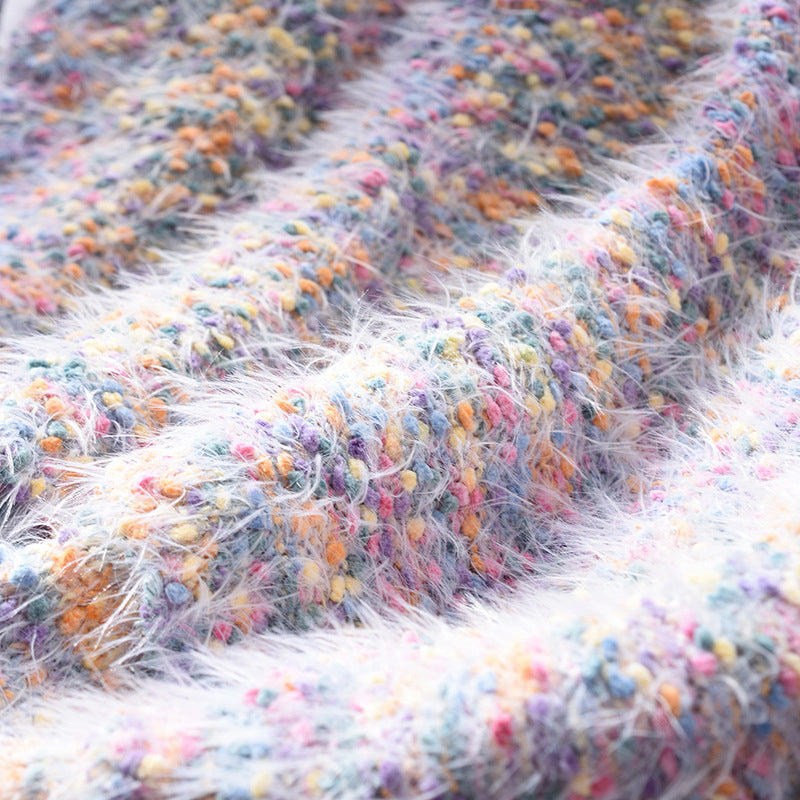 Suéter de lunares coloridos